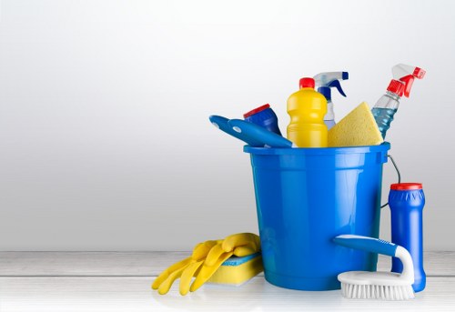 Carpet cleaning technician preparing safe equipment in an Acton property